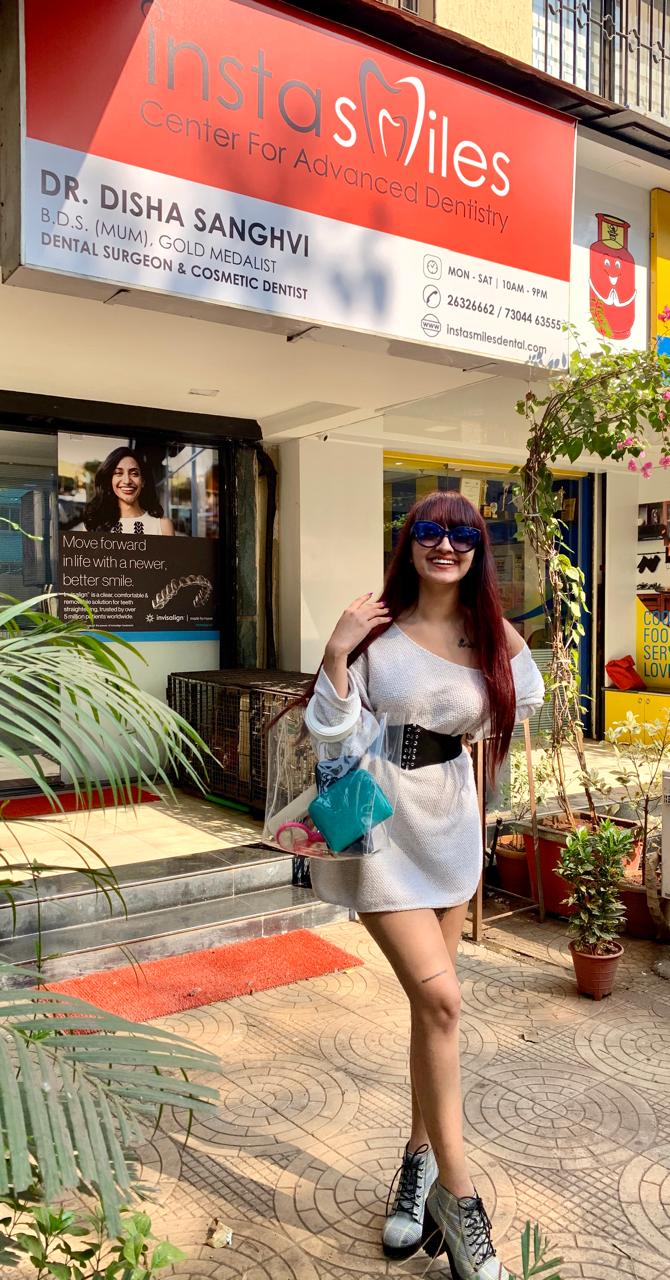 Dr. Disha Sanghvi with a well-known patient at InstaSmiles Dental